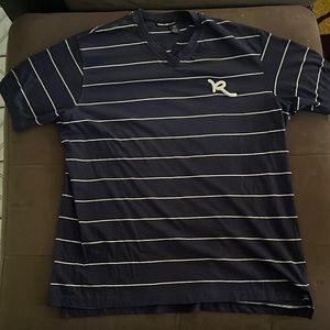 Men’s casual shirt for work or going out. The brand is rocawear. Used worn once.